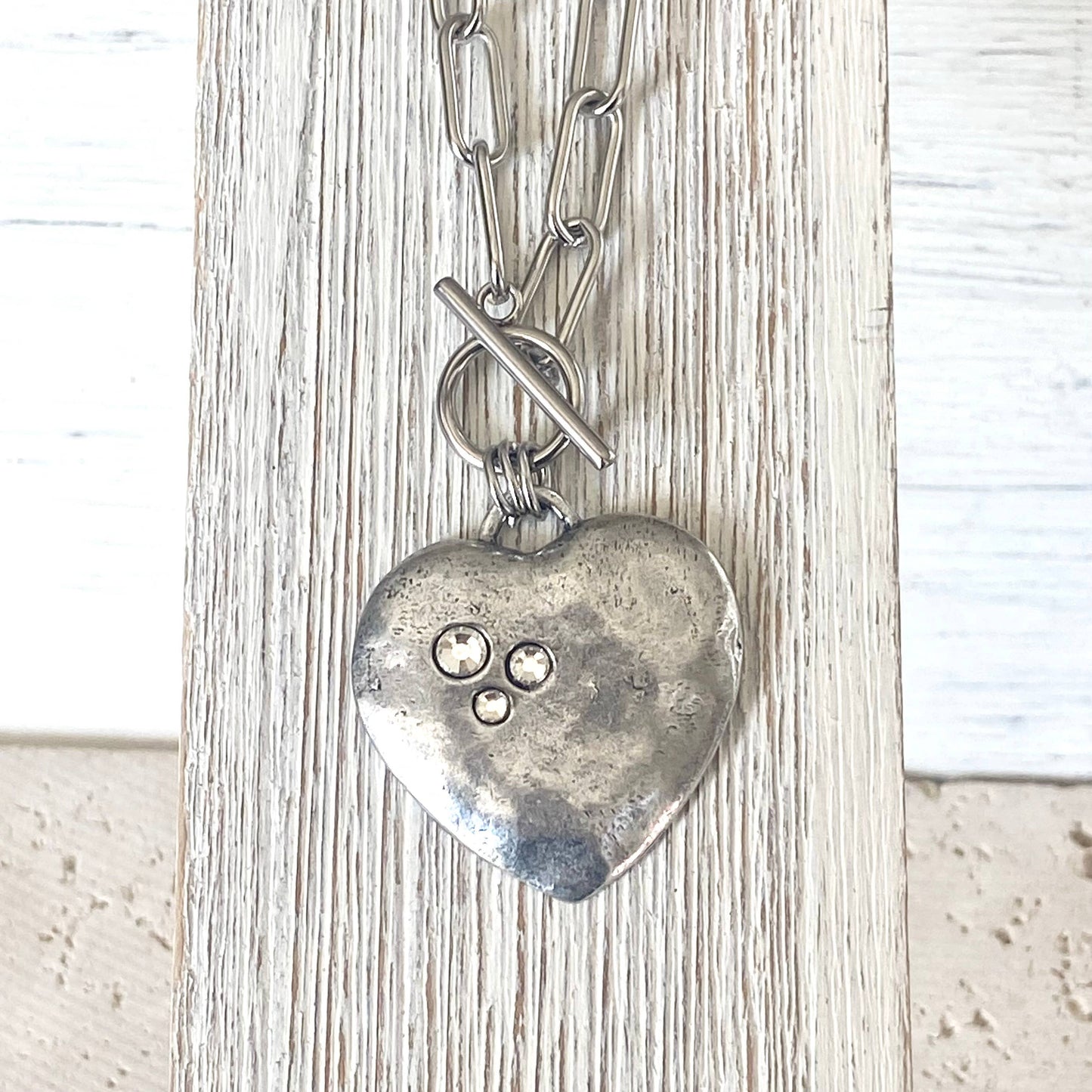 Large hammered heart with crystals statement necklace 2025