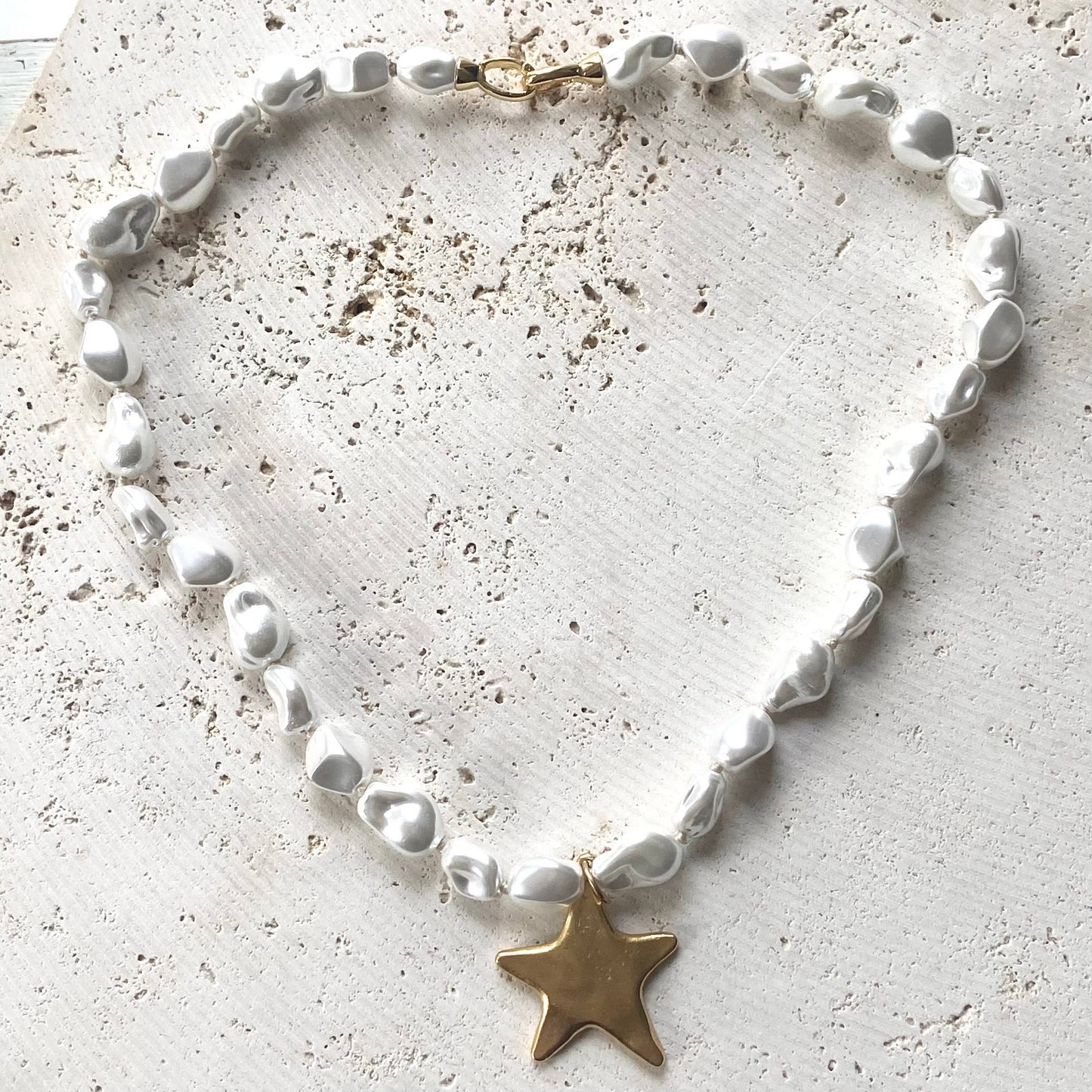 Luxe pearl strand necklace with hand casted heart or star