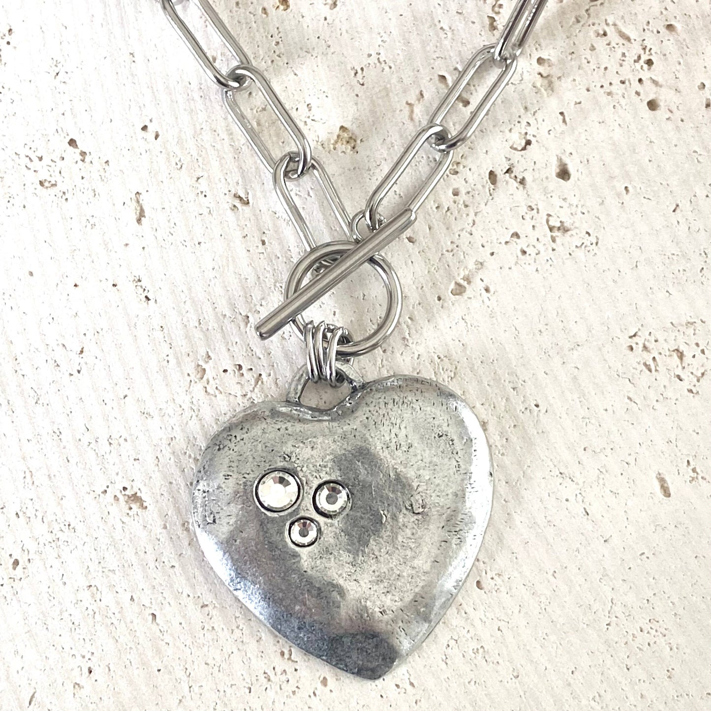 Large hammered heart with crystals statement necklace 2025