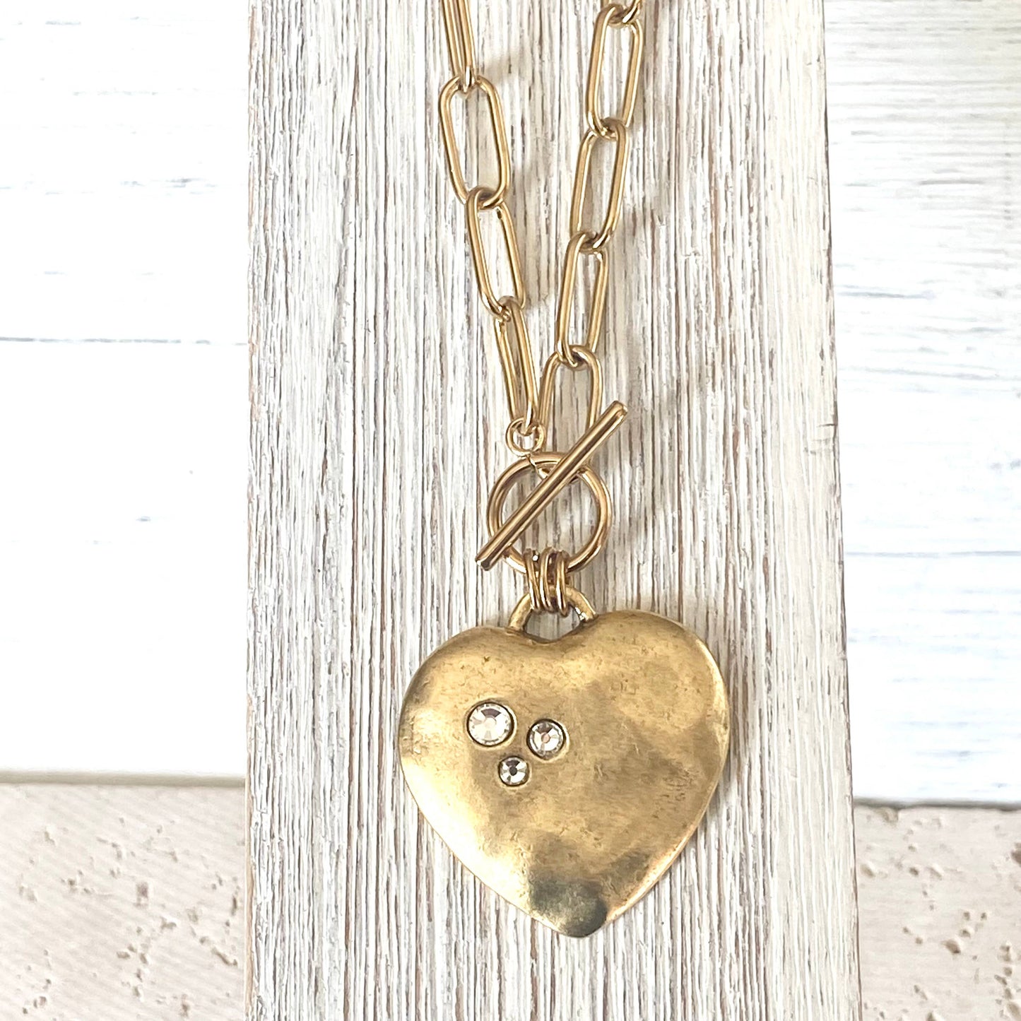 Large hammered heart with crystals statement necklace 2025